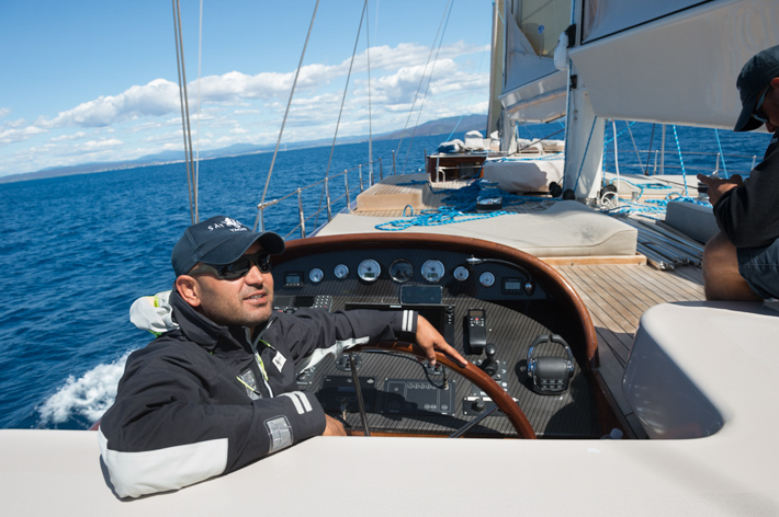 Captain Ali at the helm.