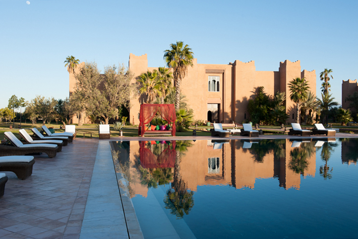 pool with riad in background